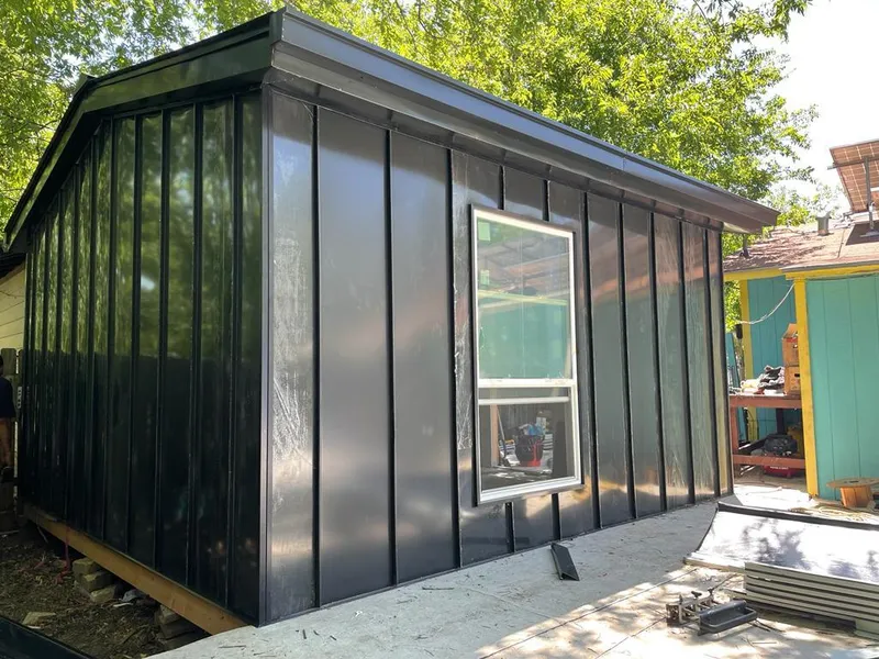 Black standing seam metal wall panels for Metal Roof Installation in Parker